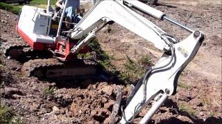 Mini Excavator Working a Steep Slope [upl. by Finkelstein85]